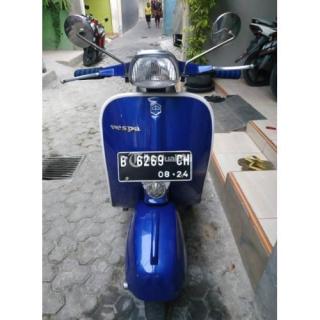 Vespa Biru Malam
